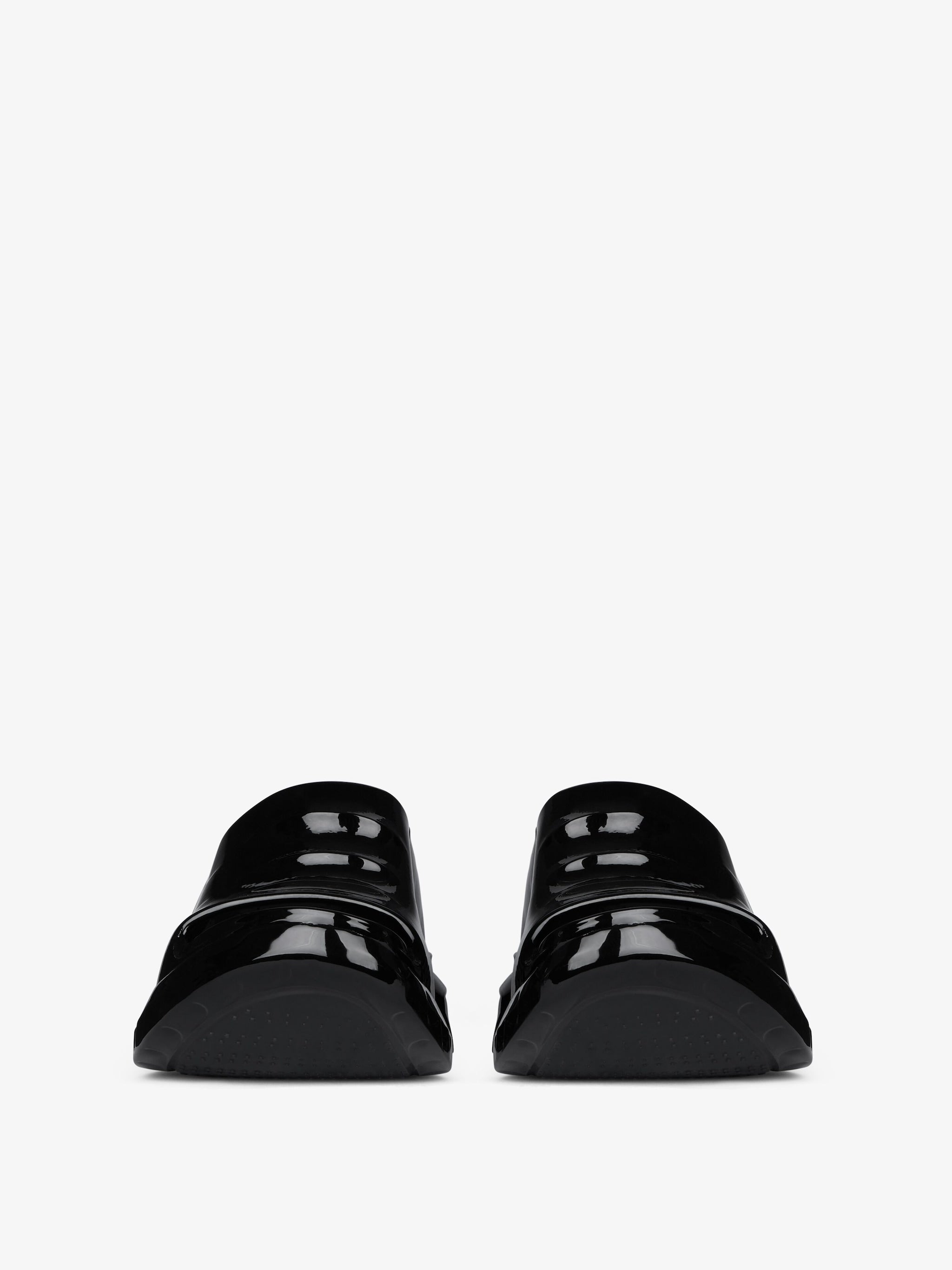 Marshmallow wedge mules in rubber