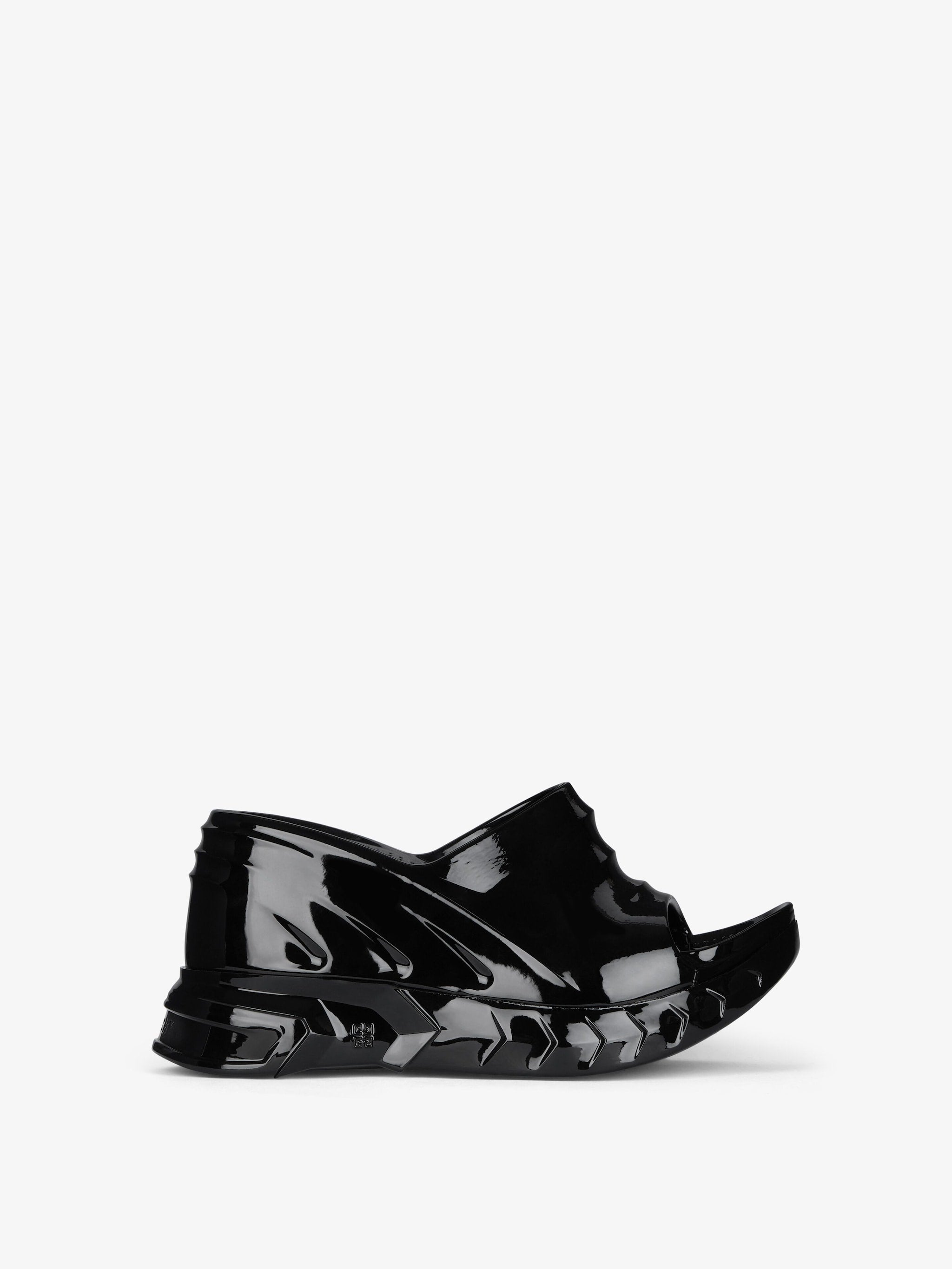 Marshmallow wedge mules in rubber