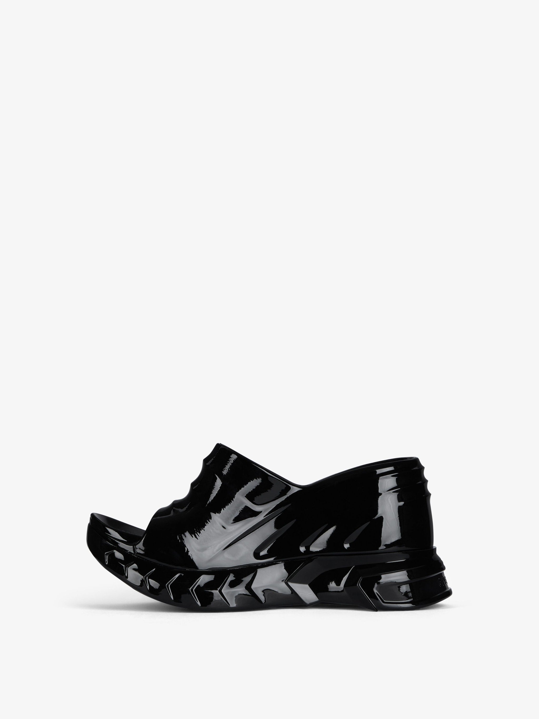 Marshmallow wedge mules in rubber
