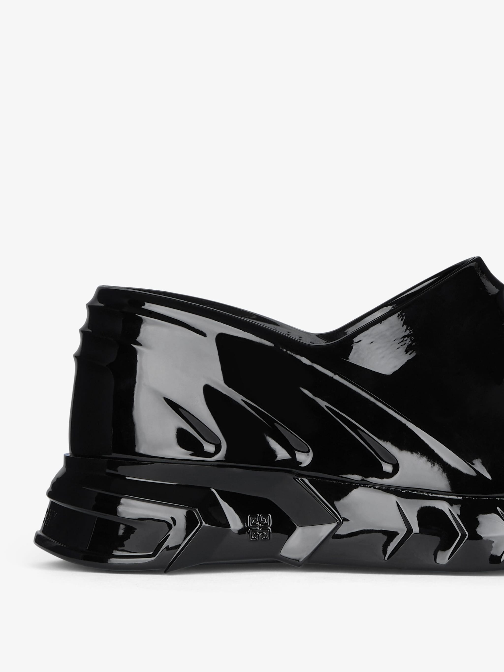 Marshmallow wedge mules in rubber