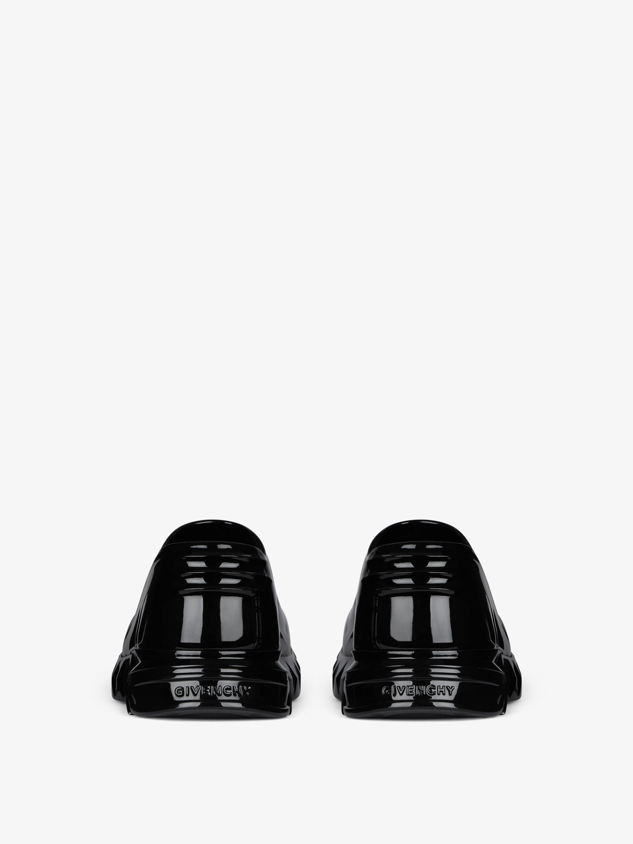 Marshmallow wedge mules in rubber